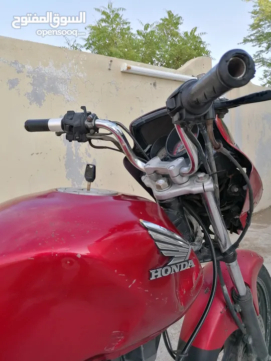 دراج بجاج هوندا 150cc لون احمر