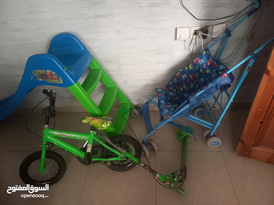 العاب للأطفال سكوترين مع عربايه للأطفال مع مرجيحة مع بسكليت بن تن