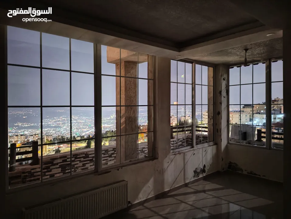 شقة  باطلالة خلابة على جبال السلط بالقرب من قصر الحمر في ميسلون   ممكن قبول نصف الثمن أرض في عمان