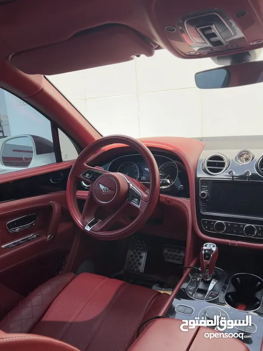 WHITE COLOUR EXTERIOR BENTLEY BENTAYGA WITH COOL RED INTERIOR