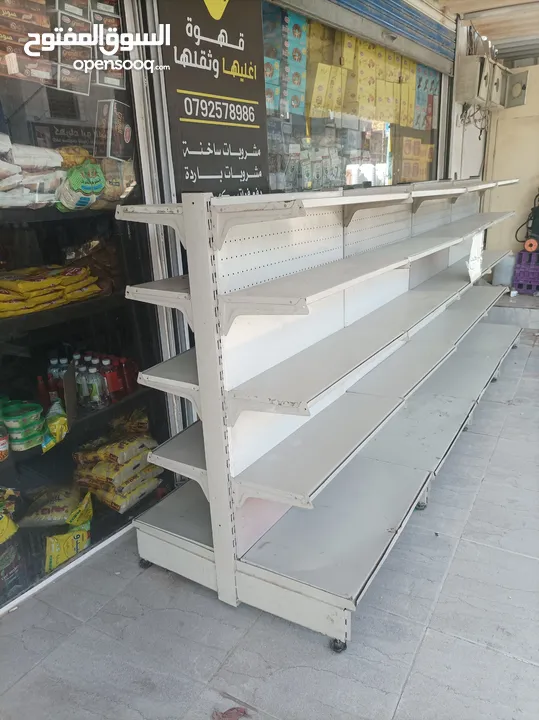 ستاند بضاعه وسطي متعدد الاستعمالات