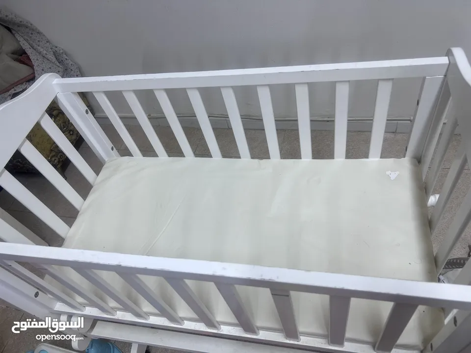 Baby bed with mattress and baby toys all 110 very clean