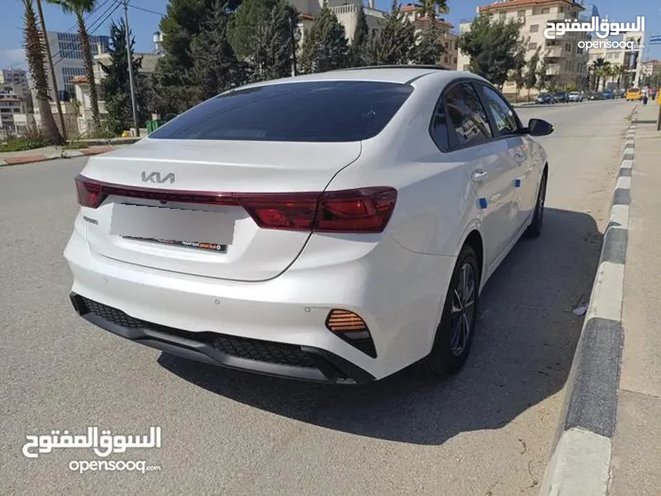 سيراتو k3 2022-2023 بنزين 8800 كيلومتر بحالة الوكالة  دهان الشركة الأصلي
