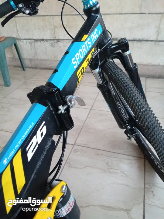 دراجة هوائية من نوع SPORTS INC من طراز SHIMANO جنط 26 باللون الأزرق اقرأ الوصف بدقة قابل للتفاوض