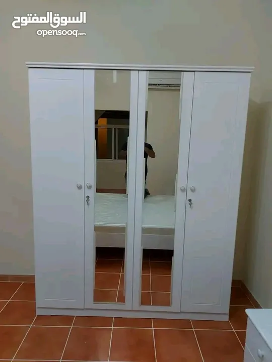 Brand New 4 Door Cabinet