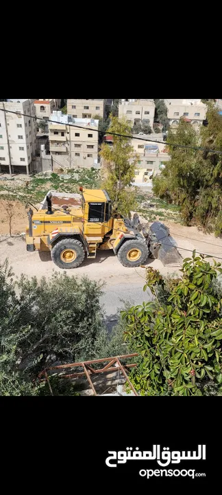 تعهدات عامة وهدم مباني ونقل جميع أنواع مواد البناء ونقل تراب أحمر وتعبيد الشوارع بأفضل أنواع الخلطة