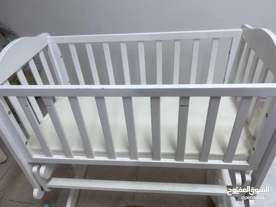 Baby bed with mattress and baby toys all 110 very clean