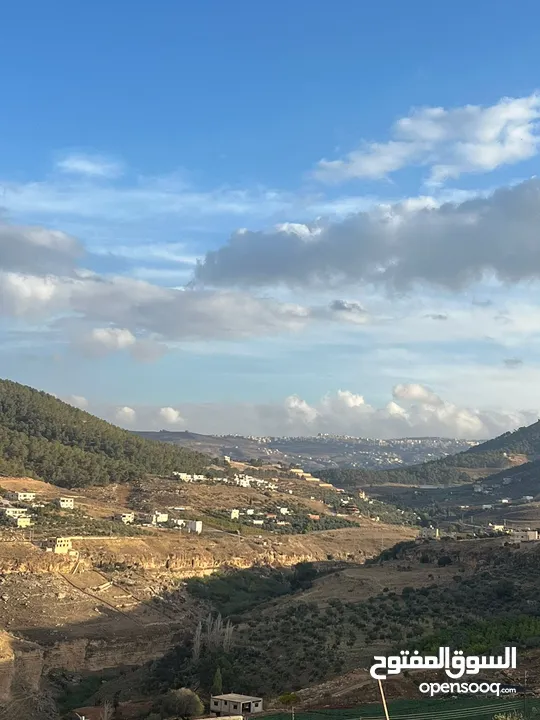 ارض للبيع اراضي شمال عمان السليحي بجانب تل الرمان مساحة 3400مترمطله على سد الملك طلال
