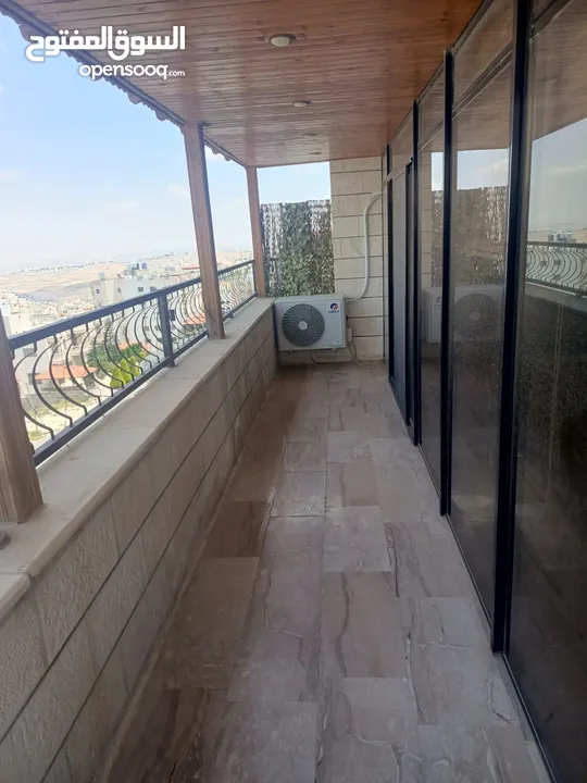 شقة طابق ثالث مع روف ضاحية الرشيد