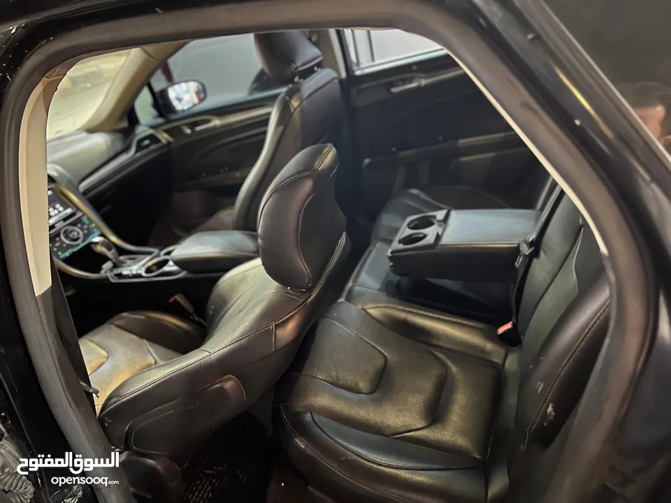 فورد فيوجن 2015 تيتانيوم انيرجي  فل كامل بحالة الوكالة ممشى قليل جدا إ 97 الف فقط