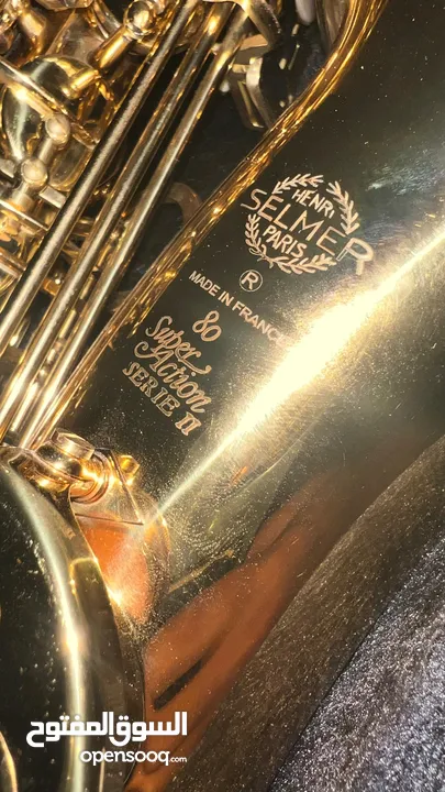 ساكسوفون طقريبا جديد بحالة ممتازه مع ستاند و ستراب  Alto Saxophone like new in excellent condition