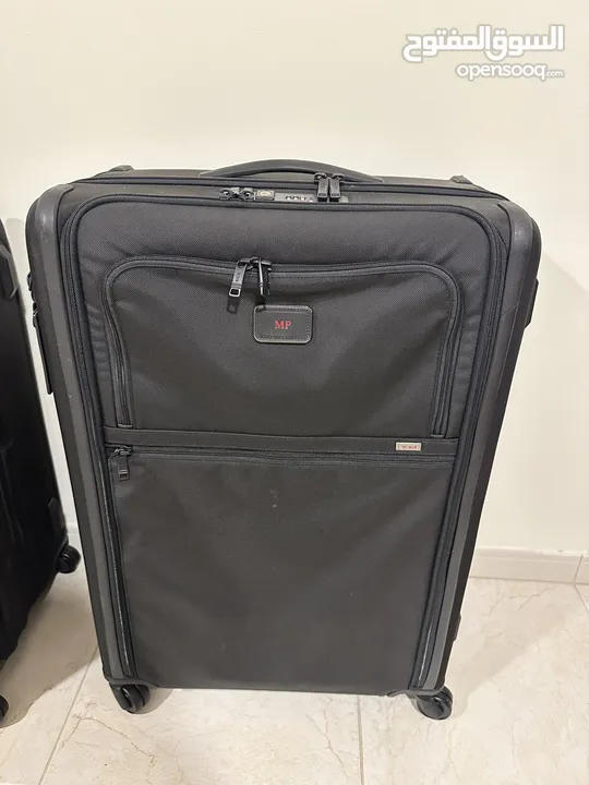 TUMI suitcases