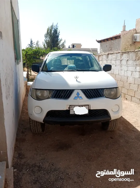 بك اب متسوبيشي   l200 موديل 2009 فور ويل 4X4