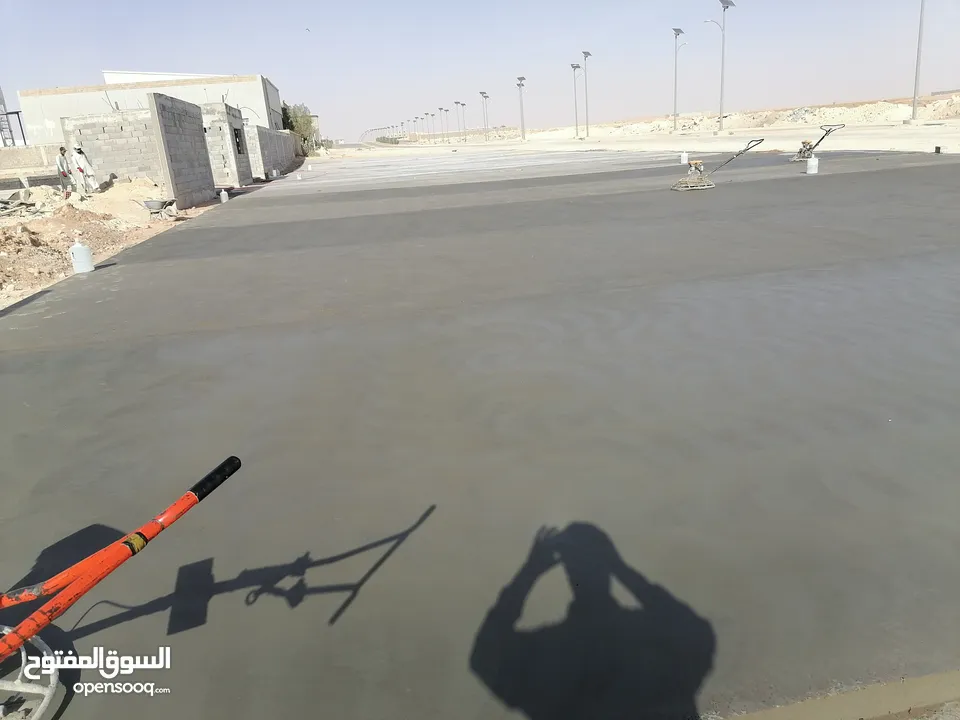 Helicopter finishing concrete