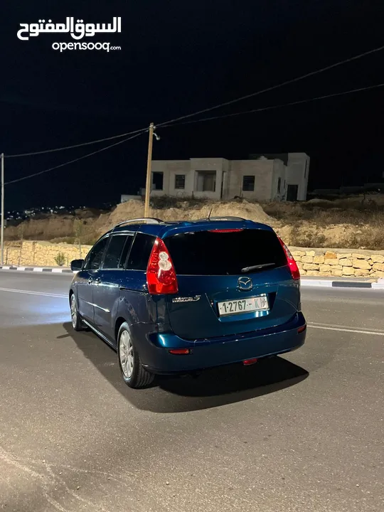 مازدا 5 جير عادي 6+1 متور 2000 بنزين رخصه و تامين جديد  عداد قليل فحص نخبب سعرر كااششش