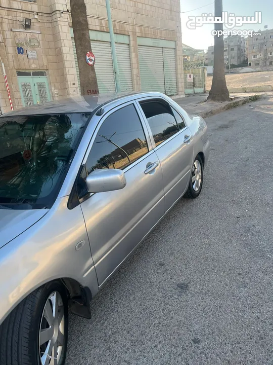 متسوبيشي لانسر 2004محدثه بالكامل 2013