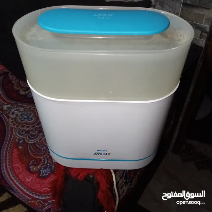 جهاز تعقيم رضعات اطفال وحافظ الحليب