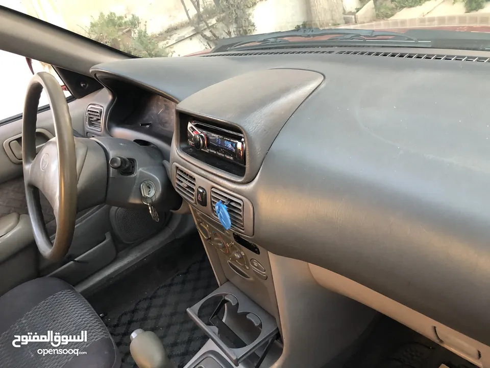 تويوتا كوروللا اوتوماتيك اصلي موديل 2000