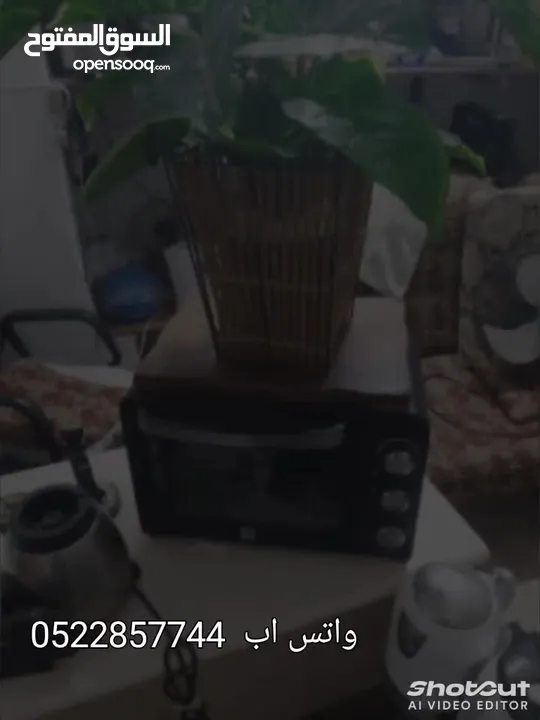 فرن كهربائي لتسخين والشوي