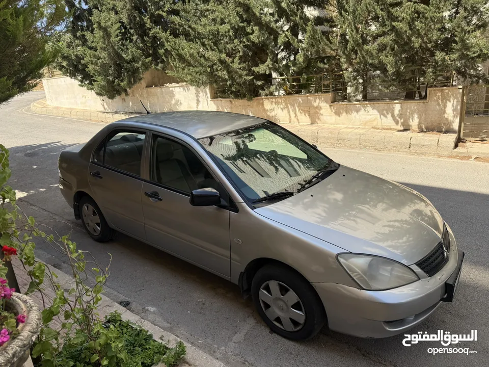ميتسوبيشي لانسر موديل 2011 للبيع ماتور 1300 4500 دينار قابل للتفاوض