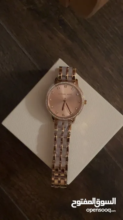 Michael Kors rose gold watch for women.