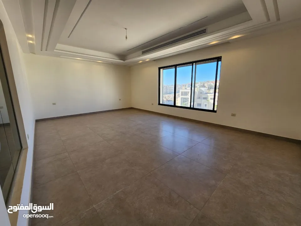 شقة طابقية فاخرة للبيع في عبدون  ref : 14389
