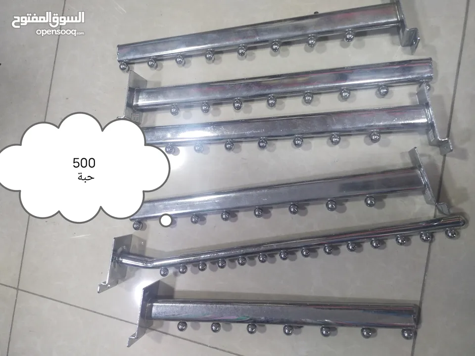 علاقة ملابس مع هوكات تعليق ملابس مع ستاندات بحال الوكالة للاتصال