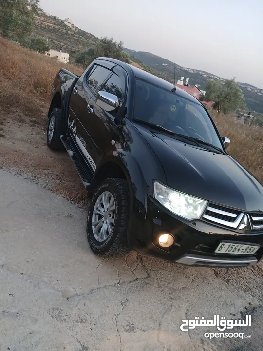 ميتسوبيشي هنتر 2015  اصل برايفت فحص ممتاز يد اولى   اتومات 4x4  رخصة وتامين شامل 6 ش