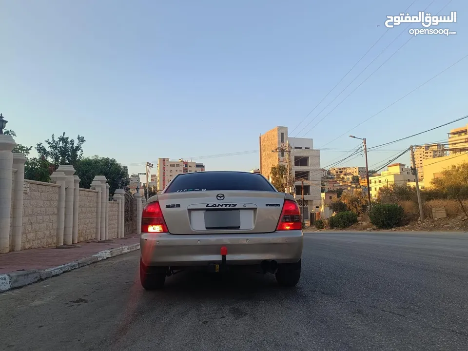مازدا 323 اتماتك فتحه اصليه تحفه بمعنا الكلمه بسعر حرق 29500 ألف نقدا بدل وارد فحص نخب