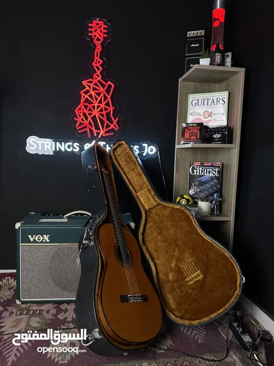 Yamaha CGX102 Plugged Classical Guitar with hardcase – 350 JDs