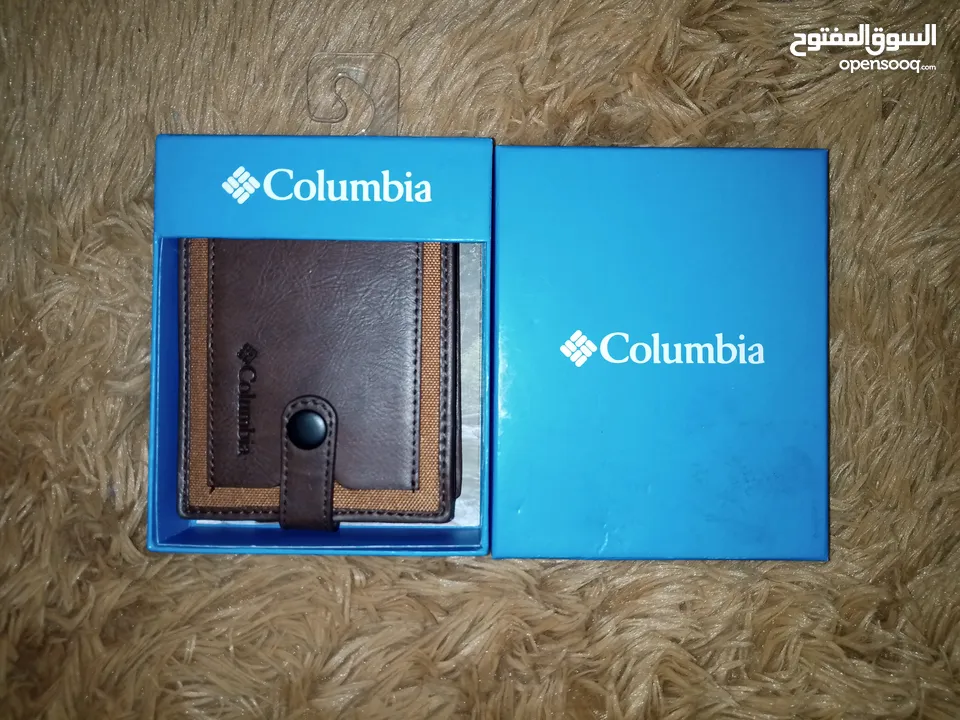 محفظة وحافظة نقود رجالي Columbia كولومبيا ثنائية الطي جلد اصلي طبيعي 100%  وارد امريكي .