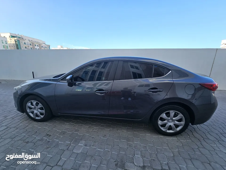 Mazda 3, 2.0L  Expat owned family car