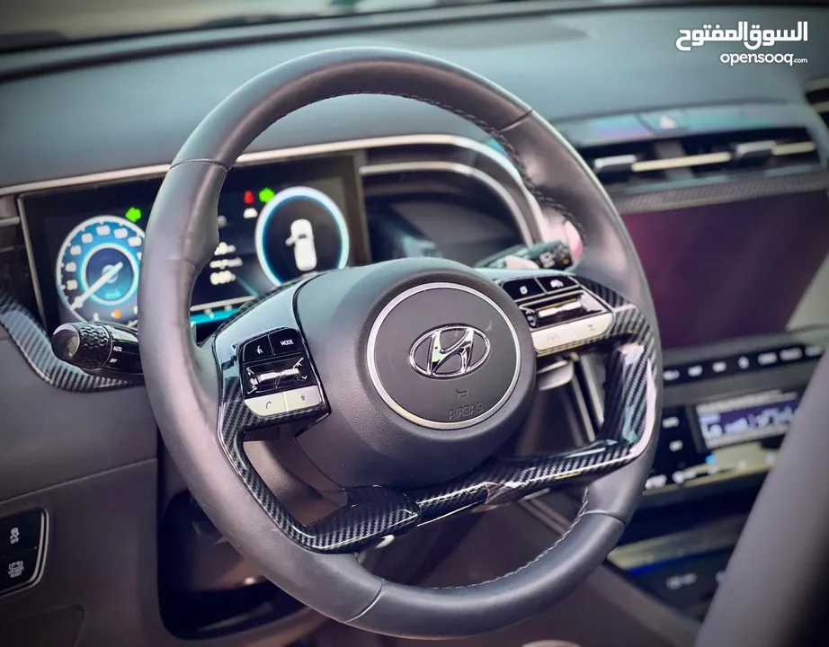 هونداي توسان/2022 فل الفل فتحة سقف بانوراما  2x4 ///240Hp بنزين + كهرباء  ( Haybrid) 1600cc