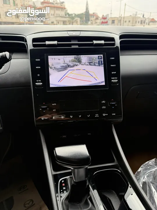 هونداي توسان ترخيص 2021 محرك 1600 بنزين+بطاريه مساعده دفع 4*2 جير أوتوماتيك 180 حصان