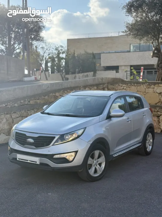 سبورتاج ديزل ماتور 2000 اتومات 4*4 اصل برايفت فحص ممتاز