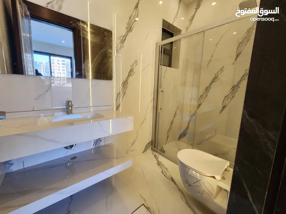 شقة طابقية فاخرة للبيع في عبدون  ref : 14383