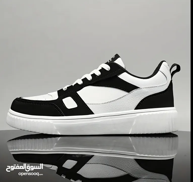 Black and white designer shoes size: 42 negotiable price FREE DELIVERY