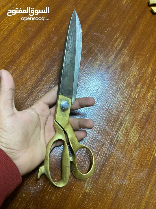 جاط ومقص وشكل طائر نحاس