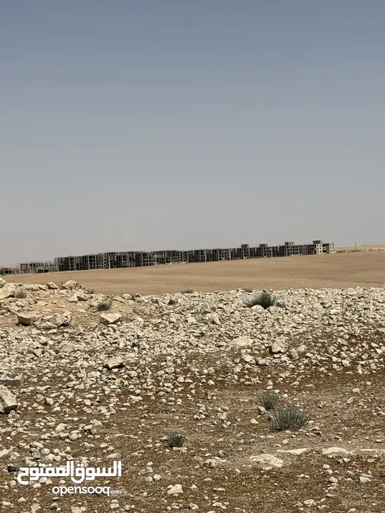 ارض في الجيزه على شارعين مقابل مجمع الدوائر