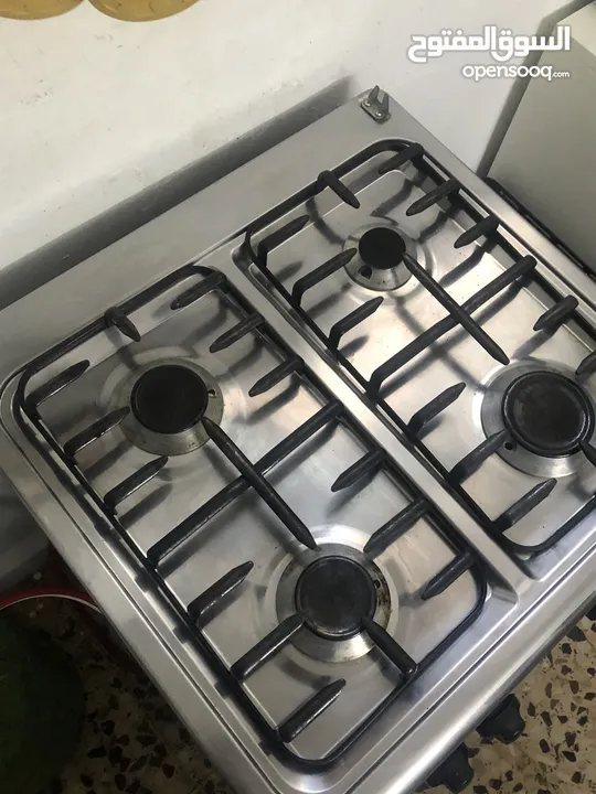 Medium size stove With Oven  Works very well. Good for small family