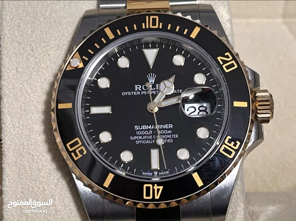 ساعة Rolex Submariner Silver and Gold Oyster Bracelet wBlack Bezel فيرست كوبي
