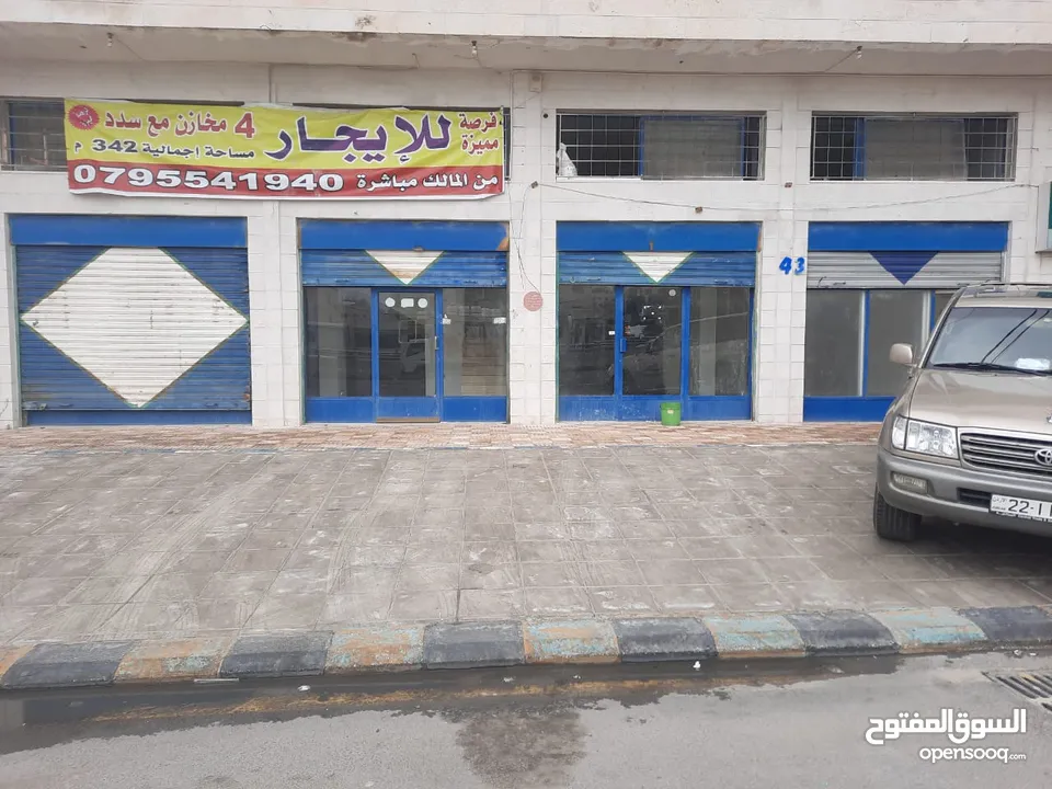 محلات تجارية مؤجرة عدد 4 للبيع تمليك في مرج الحمام على الشارع الرئيسي بمساحة اجمالية 342م