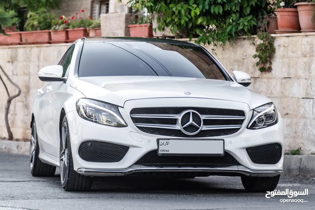 Mercedes C200 Amg kit 2015 مميزة جدا،  وارد و بحالة الوكالة