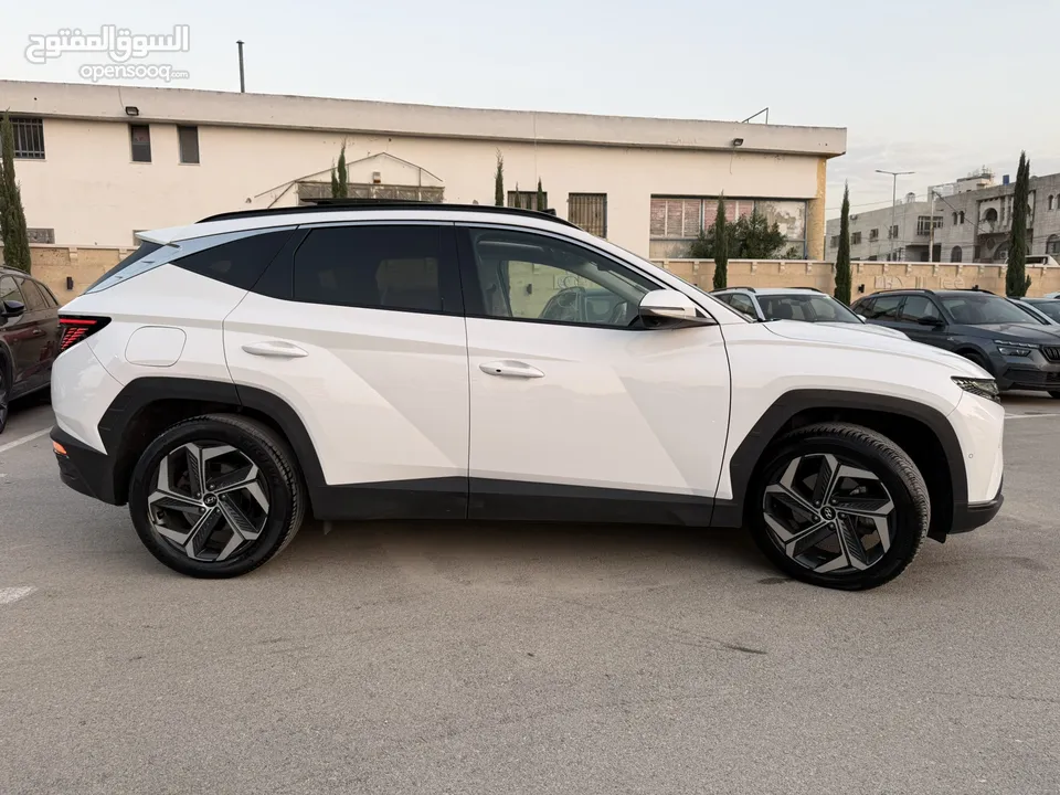 هونداي توسان ترخيص 2022 محرك 1600 هايبرد plug in/يقطع على الشحنه 65 كيلو متر 271 حصان