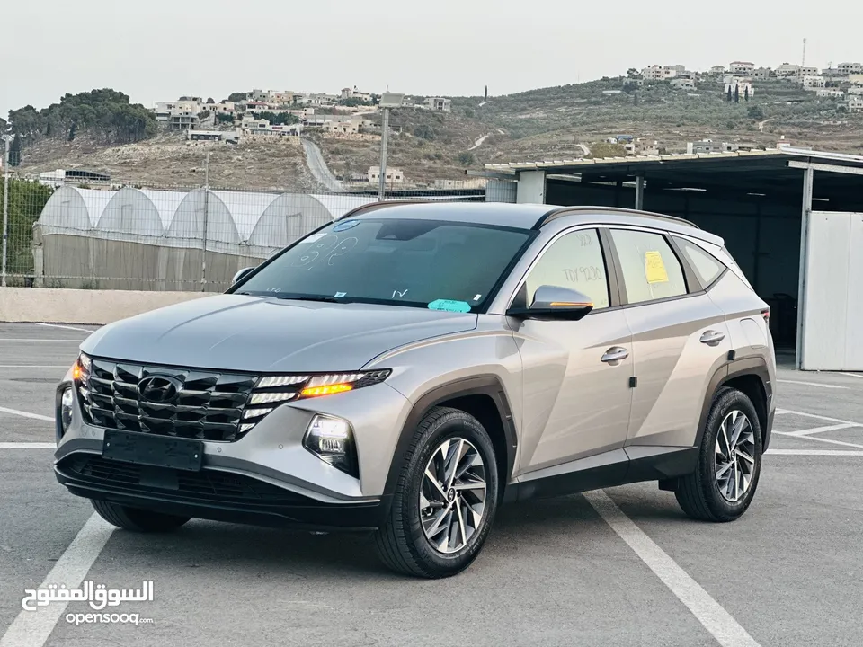 هونداي توسان 2022 فل بدون فتحة سقف  2x4 ///240Hp بنزين + كهرباء  ( Haybrid) 1600cc