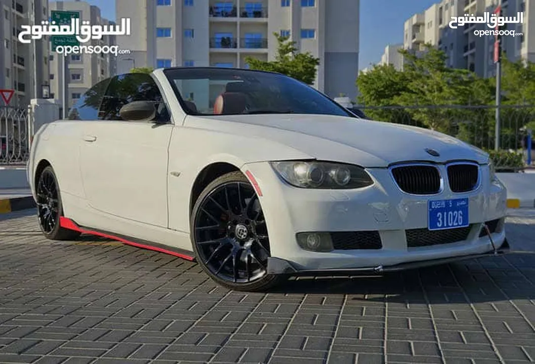 2009 BMW 335i Twin Turbo / Hard Top Convertible / Low Mileage for its age.