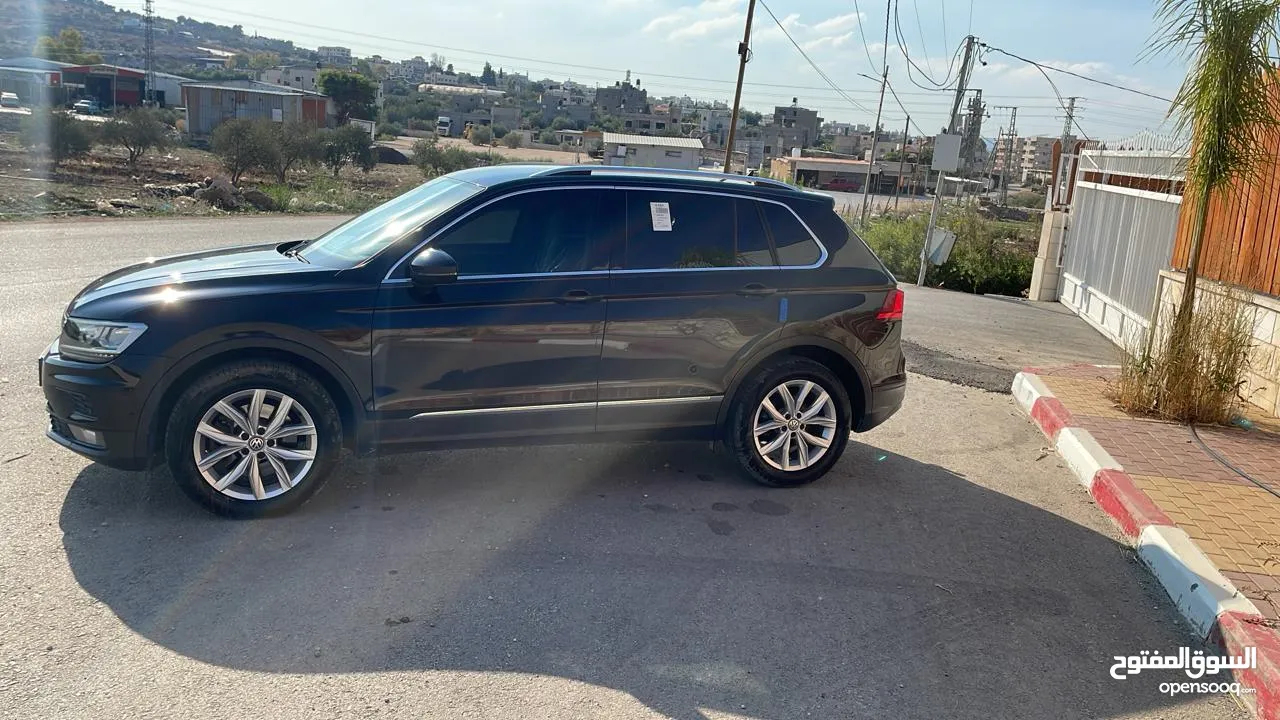 جيب تيجوان بنزين ماطور 2000 190hpصنع شهر6 2020 ولا غرام بوية ترخيص+تأمين شامل سنة كاملة لشهر 10/2026