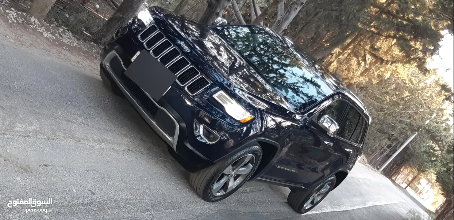 جيب جراند شيروكي 2016 ليمتد فحص كامل بانوراما  لون مميز جدآ واضح ممشى قليل  Jeep  4x4