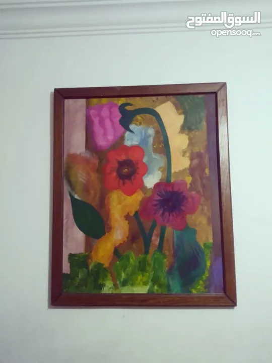 لوحات  رسم زيتي.. وتطريز