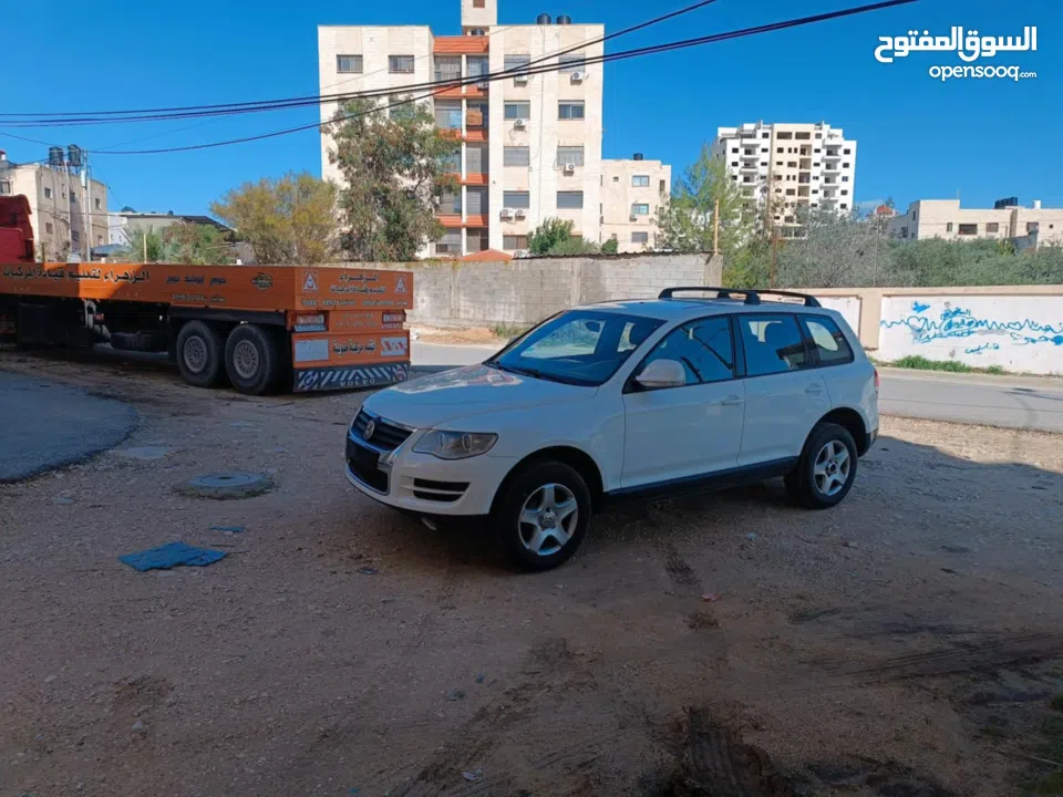 فولكس فاجن طوارق 2008 بحالة الوكالة  ماتور ديزل 3000 V6 عداد 145000 جير و ماتور و شصيات 100% وعلى ال